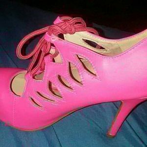 Neon pink heels